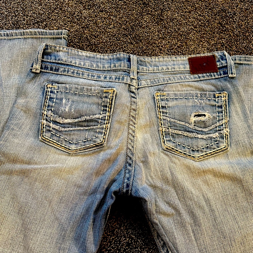 Women’s buckle jeans
